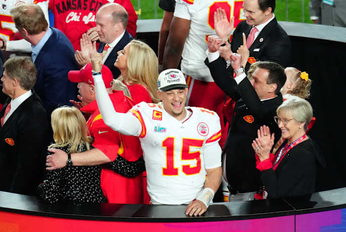 Feb 12, 2023; Glendale, AZ, USA; Kansas City Chiefs quarterback Patrick Mahomes (15) waves to the crowd after defeating the Philadelphia Eagles in Super Bowl LVII at State Farm Stadium. Mandatory Credit: Patrick Breen/The Republic via USA TODAY Sports